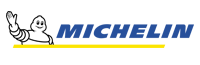Michelin Man mascot waving next to blue